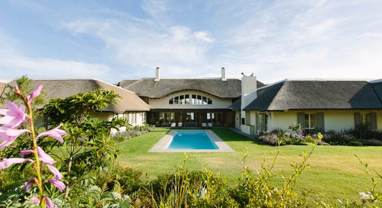 The Thatch House Poolside View